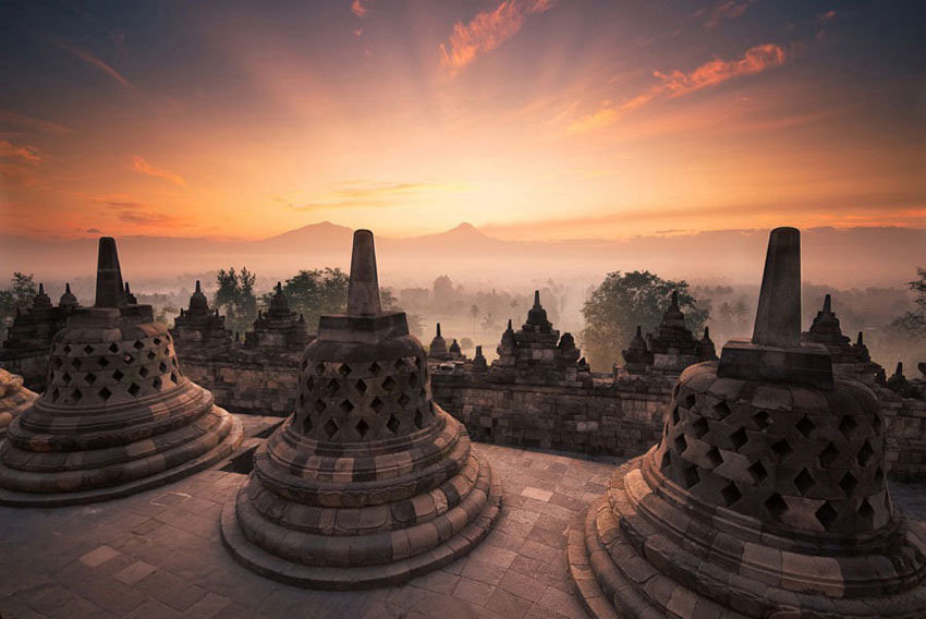 Image taken on top of Borobudur, a Buddhist temple outside of Yogyakarta. Photo credit: Marc Schmittbuhl